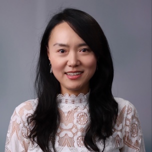 Smiling in white blouse